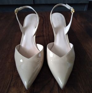 Stuart Weitzman beige nude patent pumps